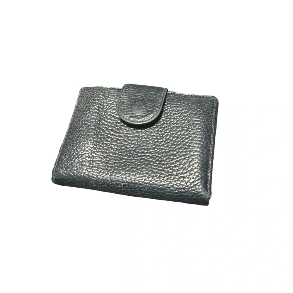 Dark navy leather wallet with exterior coin compartment. GUC